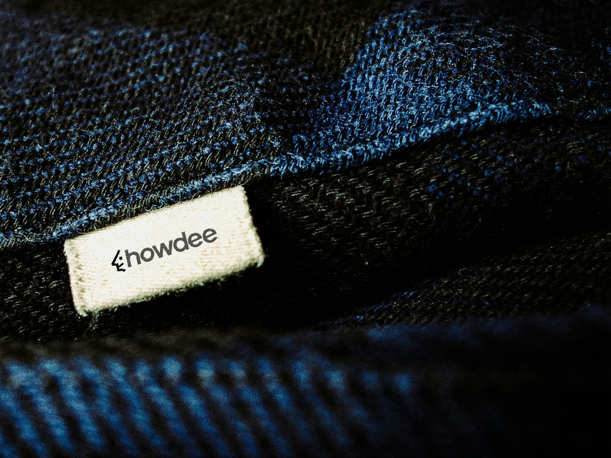 Howdee woven label on denim