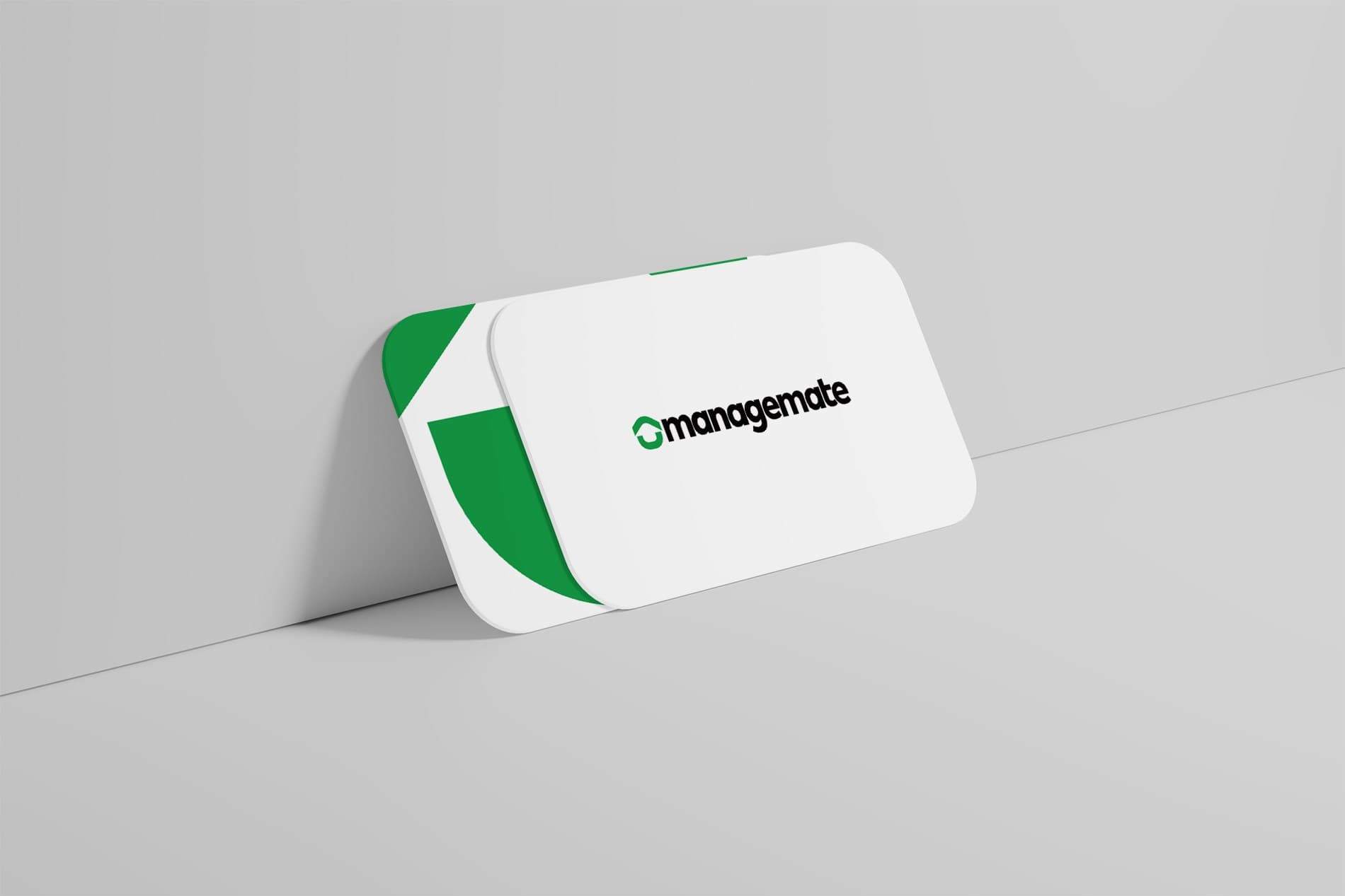 Managemate business cards with green brand elements