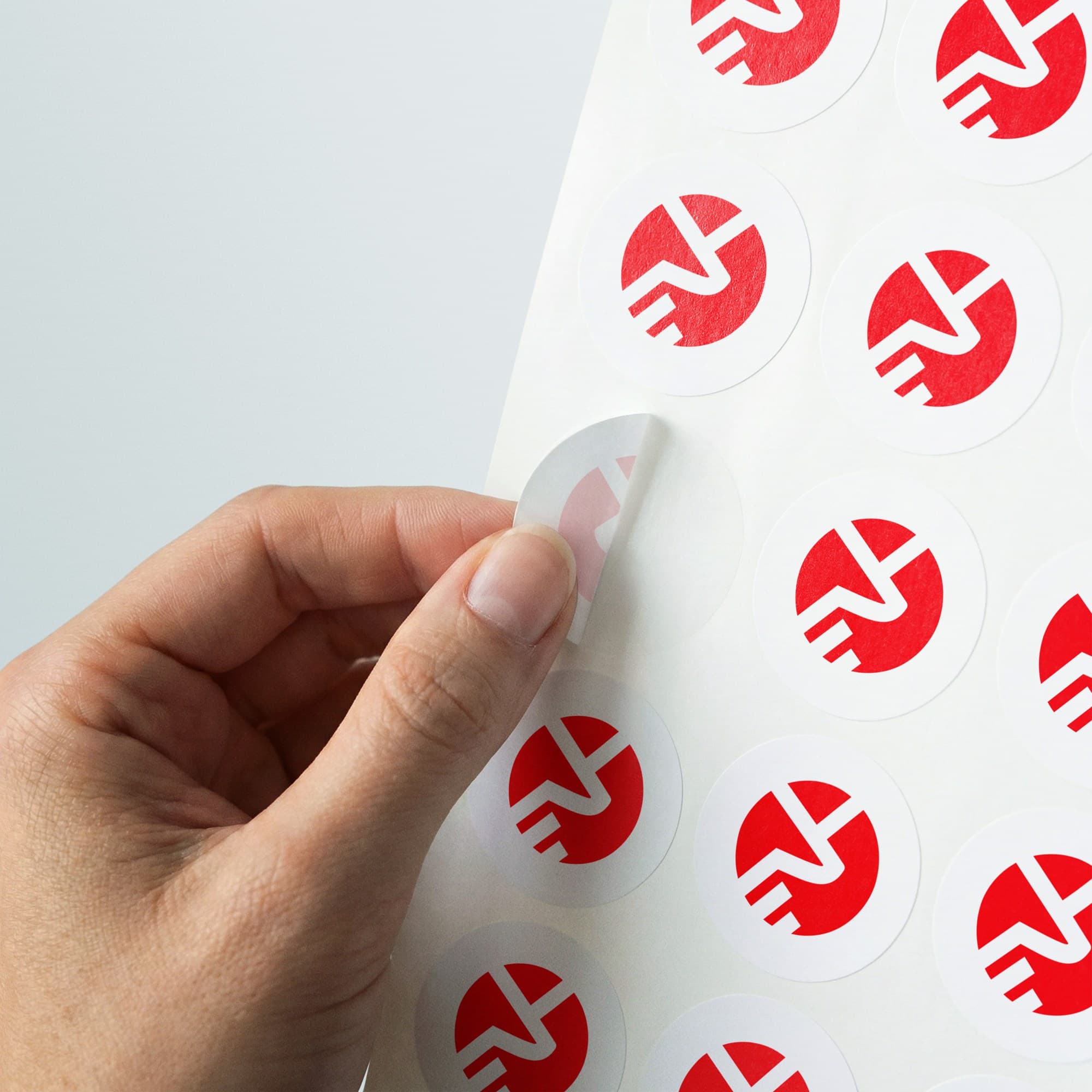 Unipoint red symbols on a sheet of round labels